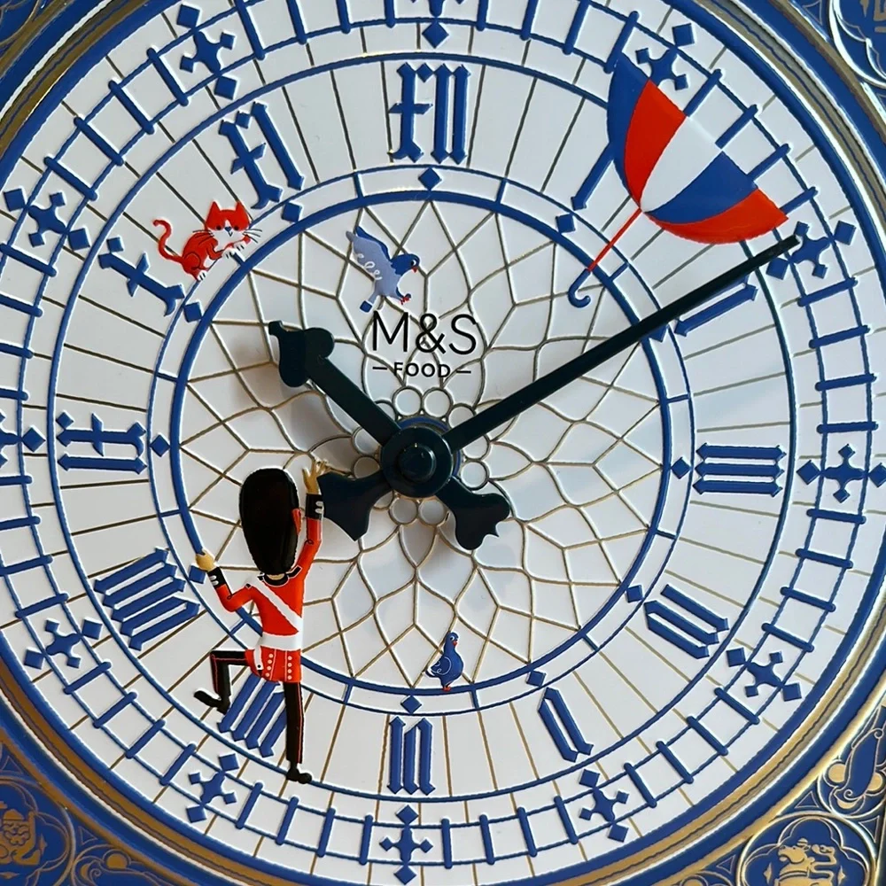 Marks and Spencer Blue and White Tin Clock